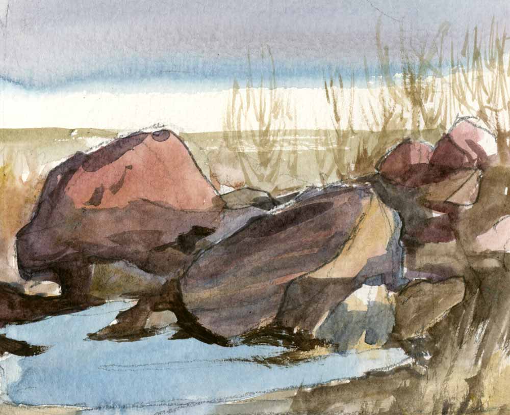 Watercolor plein air sketch of a pile of sandstone rocks and boulders catching afternoon sunlight.